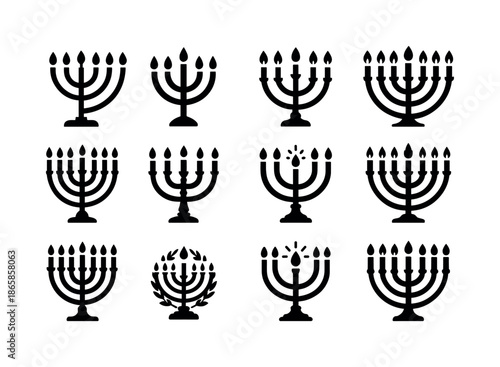 Traditional Menorah Icons. Traditional Menorah Icons. Solid icon set of Traditional Menorah Icons: classic menorah, curved branches, candle flames, center