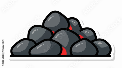 A pile of rounded, dark gray stones with shiny highlights, some with red peeking through