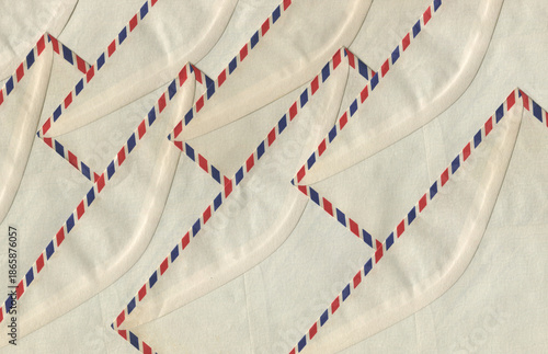 Canvas Print Vintage airmail envelopes arranged in a repeating pattern forming a textured pos