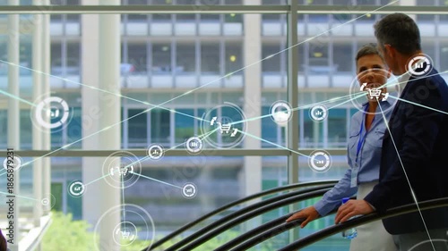 Animation of connected icons, multiracial coworkers sharing ideas while getting down from escalator