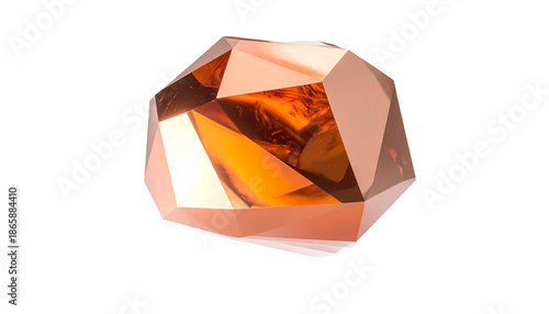 A faceted, transparent, gem-like object with warm orange and brown tones