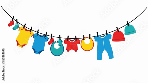 Colorful baby clothes and hats hang on a clothesline