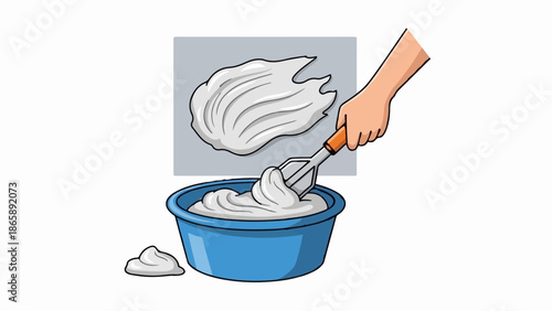Hand holding a trowel, mixing white paste in a blue bowl, preparing for application