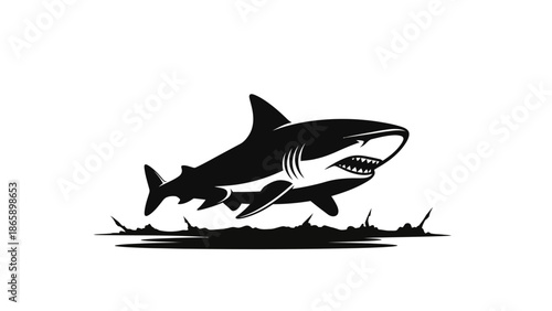 Black silhouette of a shark swimming.