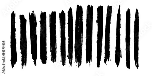 Set of isolated black and white ink and paint splashes with a macro pencil on a wooden steel tool object