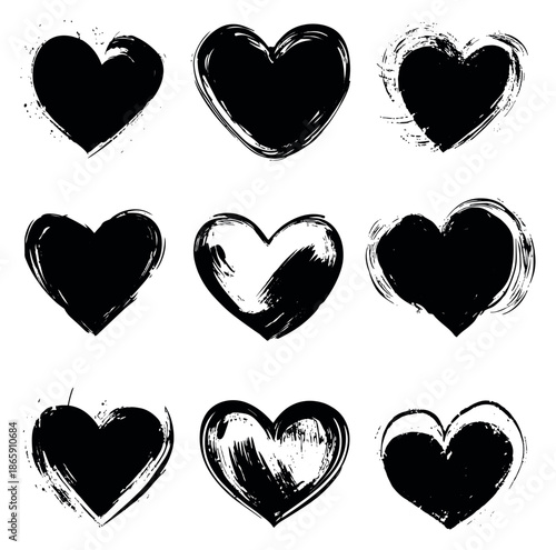 Grunge hand drawn heart symbols set featuring expressive brush strokes and artistic textures for romantic designs and valentine's day decorations