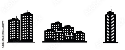 Silhouette of urban skyscrapers and buildings against black background