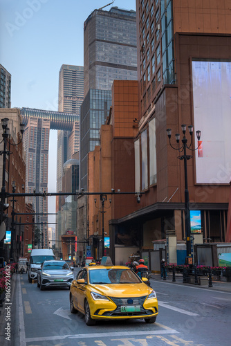 Taxis and traffic moving on the streets of Chongqing
