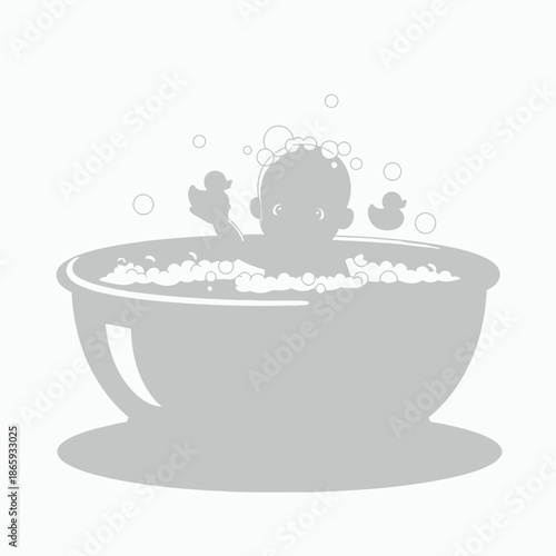 Baby silhouette in a bathtub with bubbles and toys