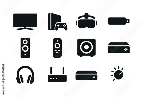 Home Entertainment Icons. Home entertainment devices. Solid icon set of home entertainment devices: smart TV, game console, VR headset, media stick, speaker