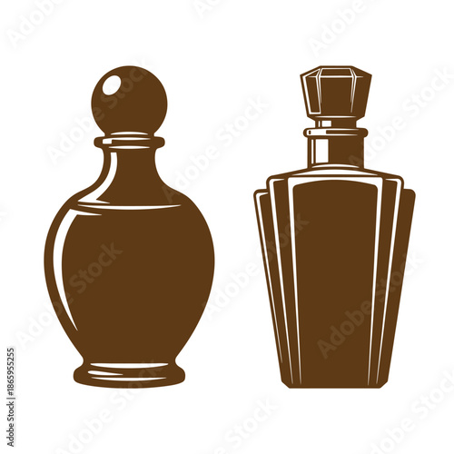 two brown perfume bottles with stoppers on white background