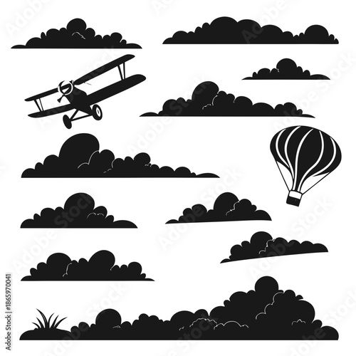 Silhouettes of airplanes and hot air balloons