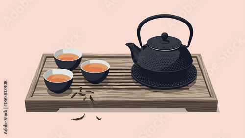 Traditional tea set on wooden tray with black teapot and cups