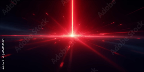 Bright red laser beam shining in a dark space with flare