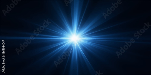 Bright blue light shining in darkness with radiant beams