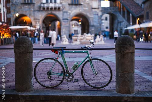 Stylish city retro bicycle in Piazza Vecchia town square in Bergamo, Lombardy, Italy. Ancient famous place in Europe