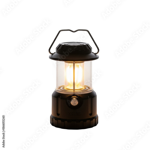 Png isolated transparent background Black camping lantern with glowing yellow light and metal handle on black background