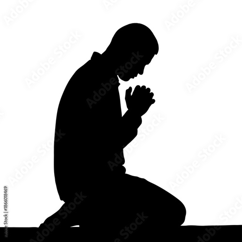 Silhouette of a Man Praying in Deep Contemplation.