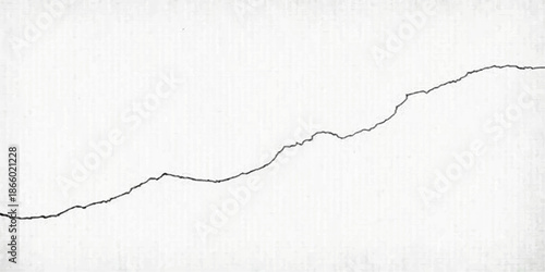 Vintage grunge texture of a ripped paper edge on an old cracked gray wall background creates a blank torn border frame for an empty cardboard banner design