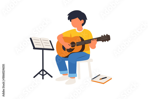 Person playing acoustic guitar with sheet music
