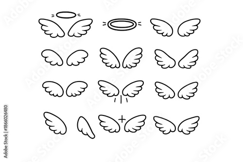 Set of cartoon angel wings with halos