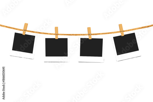 Four Empty Polaroid Photos Hanging on Clothesline