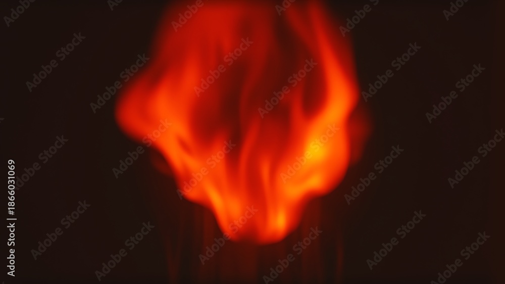 Fototapeta premium Bright orange and yellow flames dancing fire heat