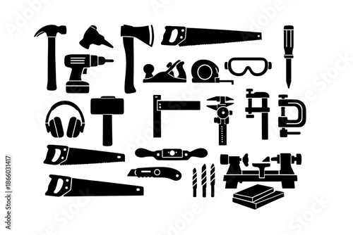 Collection of Black and White Carpenter Tools on a Grey Background