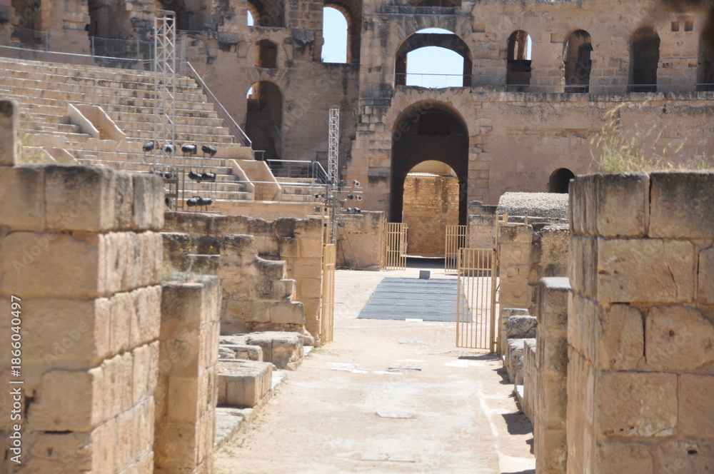 Fototapeta premium The Amphitheater of El-Djem, the second largest historic amphitheater in the world, built by the Romans in the 3rd century AD. Africa, Tunisia,