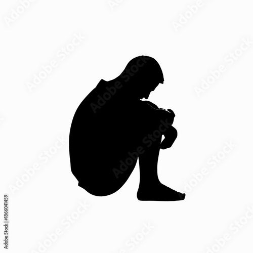 Silhouette of a Man in Deep Thought and Despair.