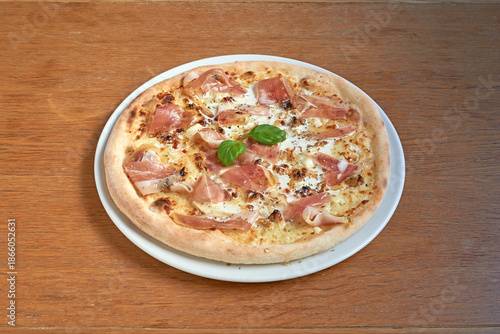 Wallpaper Mural Pizza  italian ham on white plat on wooden table Torontodigital.ca