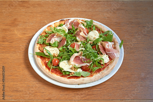 Wallpaper Mural Pizza bufala on white plat on wooden table Torontodigital.ca