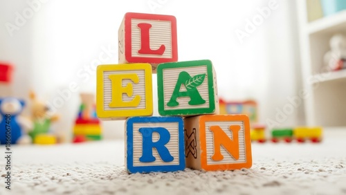 Wallpaper Mural Colorful wooden alphabet blocks spelling 'LEARN' in a playful arrangement Torontodigital.ca