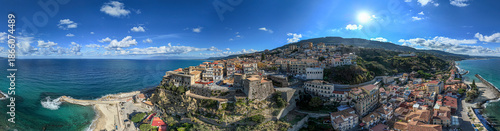 Aerial view of Pizzo Calabro, pier, castle, Calabria, tourism Italy. Panoramic view of the small town of Pizzo Calabro by the sea. Houses on the rock. On the cliff stands the Murat Aragonese castle