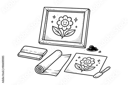 Monochrome screen printing kit featuring floral design and tools