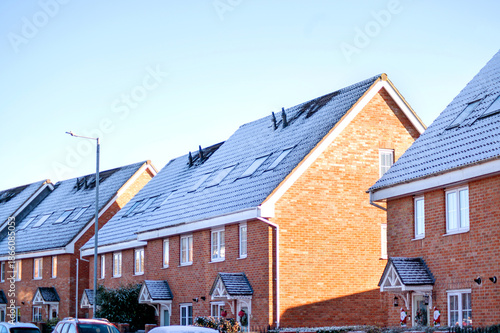 Roof covered with snow. Sunny and cold day. High quality photo