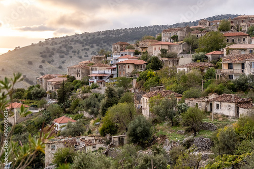 Wallpaper Mural Sonnenbeleuchtete Dorfansicht alter Steinbauten am Hang, Qeparo, Qark Vlora, Albanien Torontodigital.ca