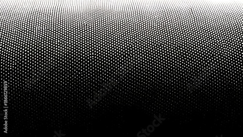 a grayscale abstract background featuring a gradient of densely packed dots transitioning from dark to light creating a textured visual effect