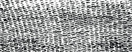 A dynamic and eye-catching abstract pattern featuring bold black and white elements, arranged in a rhythmic and organic fashion.