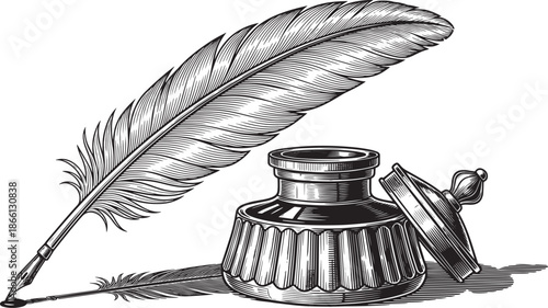 vintage quill pen and inkwell on white