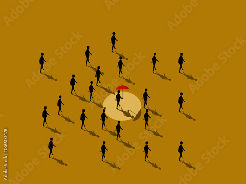businessman was walking with an umbrella standing out from the crowd
