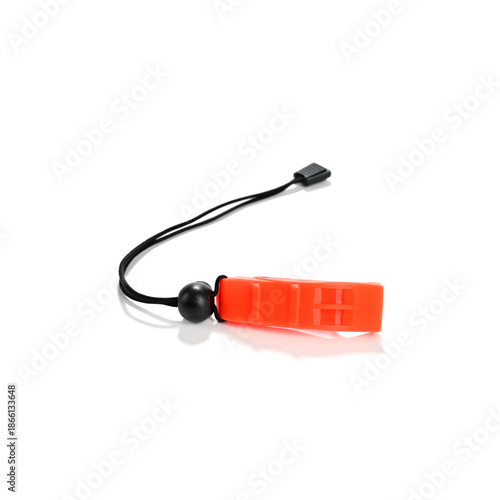 Orange fluorescent emergency whistle isolated on white background   