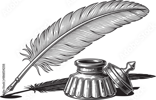 vintage quill pen and inkwell on white