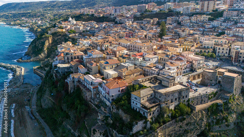 Aerial view of Pizzo Calabro, pier, castle, Calabria, tourism Italy. Panoramic view of the small town of Pizzo Calabro by the sea. Houses on the rock. On the cliff stands the Murat Aragonese castle