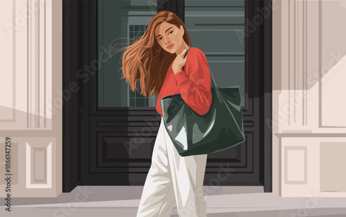 Woman walking outside a building carrying a bag