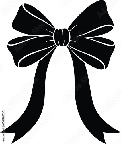 A festive red and gold ribbon bow tied in an elegant knot serves as a decorative holiday symbol for a Christmas gift or Valentine card celebration on a black background