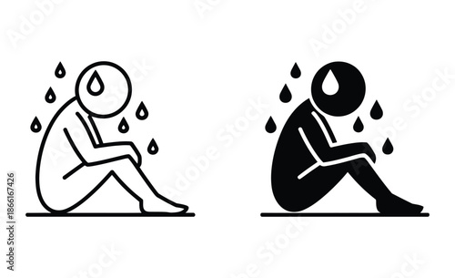 Depressed person sitting alone with sweat drops feeling anxious