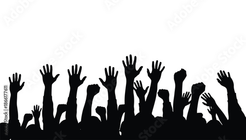 A group of people with their hands raised in the air in a gesture of celebration or protest