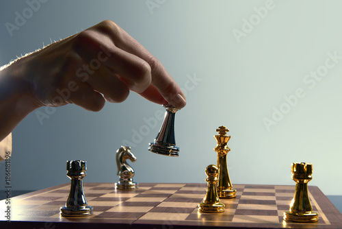 Fotografie Key chess decision moment with queen hovering above square