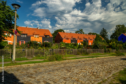 Colorful houses in the garden city of Falkenberg in Berlin